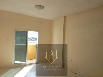 Two-bedroom apartment with a living room in Al Rashidiya 3, family building, prime location