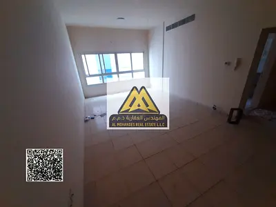 استوديو ليوارة 1 عجمان، مساحة واسعة، بلكونة، مطبخ منفصل، تكييف مركزي. 24,000 درهم سنويًا، 4 دفعات، قرب مركز الشرطة والخدمات.