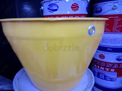 Yellow plastic bucket /