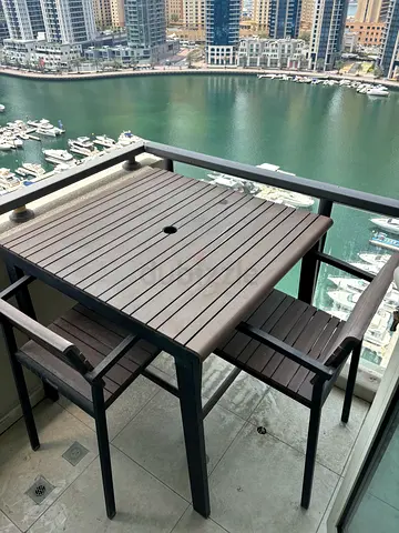 Elegant dark wooden outdoor table  2 chairs for sale!