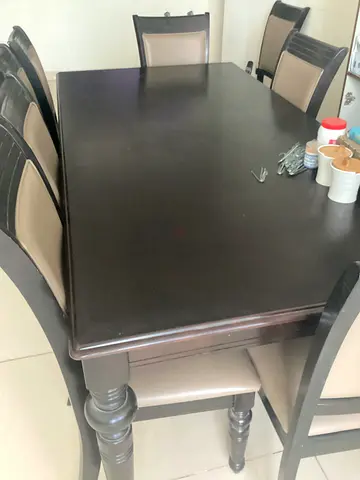 Solid Dark Wood Dining Table with 8 wodden padded Chairs