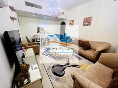 Sharjah, Al Khan, Rose Tower: a 2-bedroom apartment with a living room, 2 bathrooms, and a kitchen,