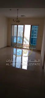 2 Bedroom Apartment for Rent in Al Qasba – Sharjah | Balcony + Free Maintenance + Prime Location L