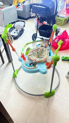 Baby jumper activity bouncer with toys - good condition