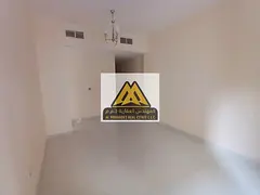 Upscale living in Ajman: One-bedroom apartment on Sheikh Ammar Street with central air conditioning