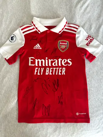 Arsenal Signed Home Jersey (Multiple Player Autographs). Saka on the back and signed by him
