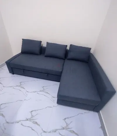 Ikea L Shape Sofa cum bed with big storage in L