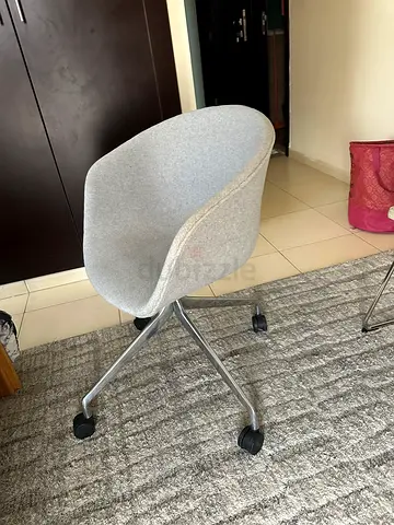 Grey Upholstered Office Chair on Wheels