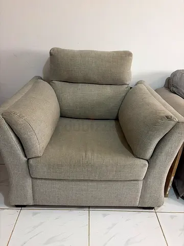 Light grey fabric armchair — good condition