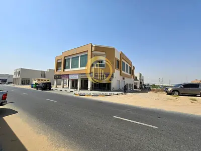 For sale: commercial land in Al-Houshi area, Al-Badiya suburb, with an area of 6006 sq. ft. Building permit: ground floor and first floor; ground fl