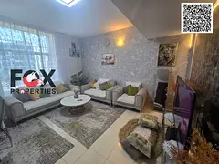Own a beautiful furnished one-bedroom apartment with a panoramic view for only a down payment of 165