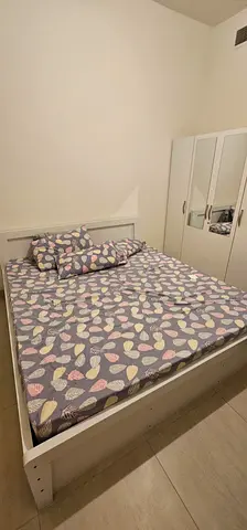 Bed and Cupboard