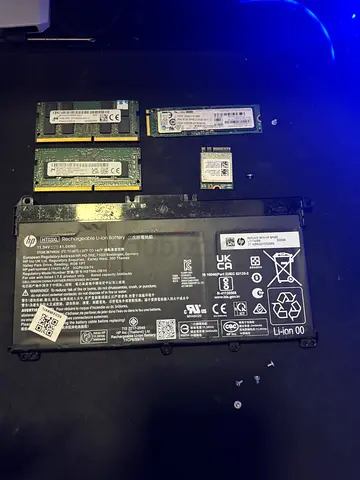 Laptop battery + 2x RAM modules (SODIMM) and M.2 Wi‑Fi card - used parts