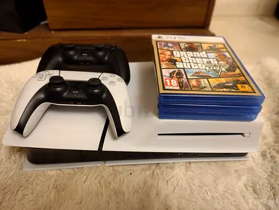 Sony PlayStation 5 Slim (International Version) with 2 DualSense Controllers and 3 Games