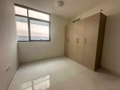 Two-bedroom apartment with a living room in Al Taawun area | 3 bathrooms | Free parking | 15 free days on the first lease | Balcony with an open view