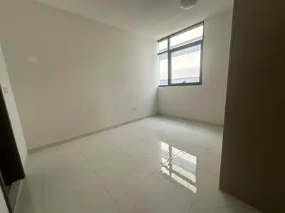 Two-bedroom apartment with a living room in Al Taawun area | 3 bathrooms | Free parking | 15 free days on the first lease | Balcony with an open view