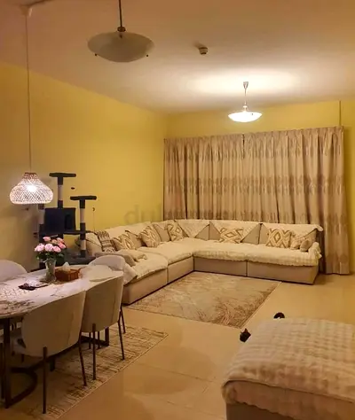 Home centre swin feather filled Corner Sofa with Footstools