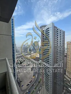 2BR master + maid room in Al Taawun, 3 baths, large balcony, wardrobes, free parking, gym &amp; pool