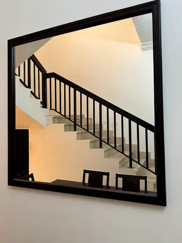 Large dark wood mirror with matching table