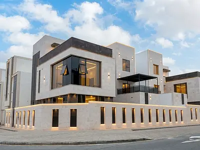 Corner villa (with pool and elevator) for sale in Ajman | Al Helio 2 area | 6 bedrooms, majlis, 2 living rooms, and roof terrace | Freehold ownership
