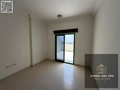 Studio apartment for annual rent in Smart Tower, spacious with balcony, gym, swimming pool, and large terrace, close to all services and near the Duba