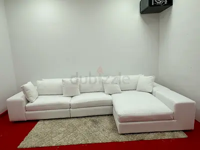 Like new condition eichholtz brand lshape sofa