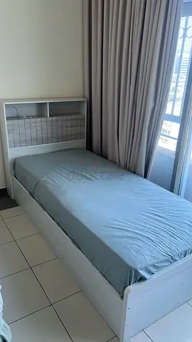 Single wooden bed frame with headboard shelf and built in charging port - excellent condition