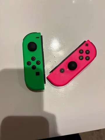 Nintendo switct joysticks pink and green