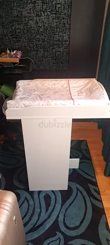 Ikea white changing table with soft padded changing mat
