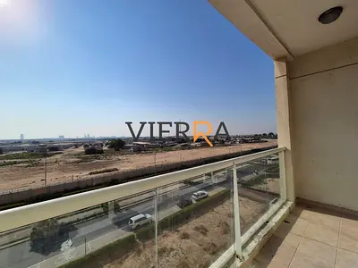 Spacious 1BR | Laundry Room | Open View