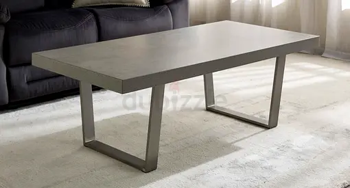 Modern Home Center coffee table with 2 side tables stone-look top and metal legs.