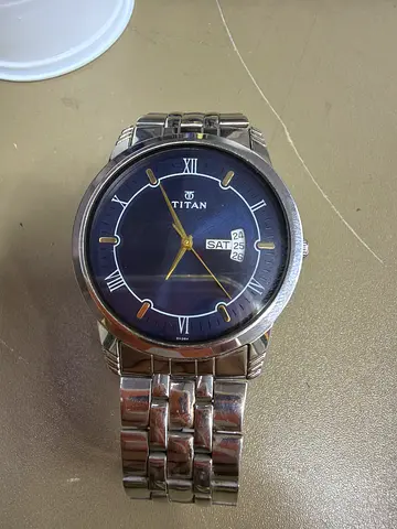 Titan Men’s Stainless Steel Analog Watch with Day-Date