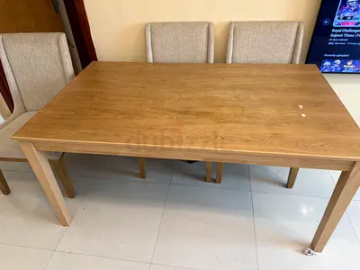 Solid Wood Dining Table with 4 Upholstered Chairs – Left leg of table shaking slightly