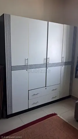 White 4-Door Wardrobe with Drawers – Good Condition