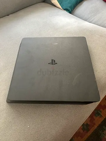PlayStation 4 Slim in good working condition — black console only
