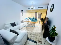 Sharjah, Al Qasba, Al Fardan Centre, one-bedroom apartment with living room, two bathrooms, and kitc