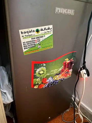 Used single-door refrigerator - compact gray unit