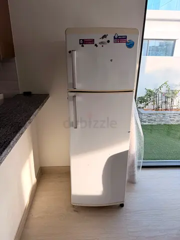 Compact white refrigerator freezer - good working condition