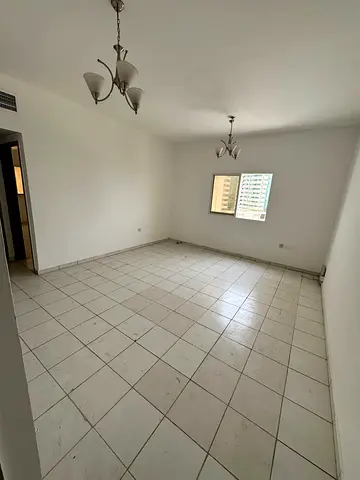 1BR apartment | Al Khan, Sharjah | Separate kitchen | Bathroom | Balcony with open view | Central AC | Built-in wardrobes | Near Dubai