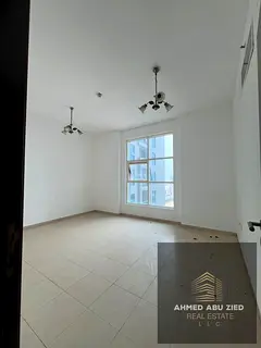 2BHK for annual rent in Al Nuaimiya 3 Ajman City Tower 2 balconies open view closed kitchen separate