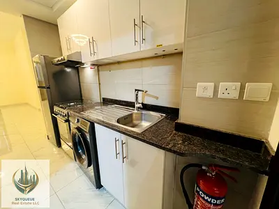 Studio with kitchen appliances | Balcony | City View