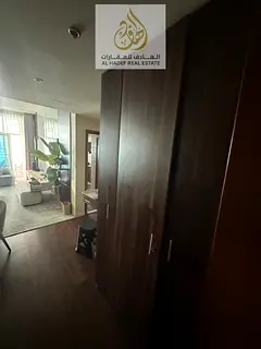 A 3-bedroom apartment with a hall available for annual rent in Ajman One Towers – Al Rashidiya 3, 