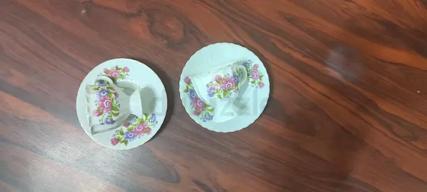 Vintage floral porcelain cup and saucer pair (small decorative set)