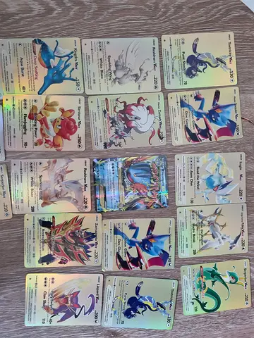 Lot of 16 Holographic Pokémon V  VMAX Trading Cards - Mixed Set