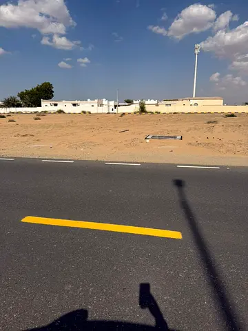 For sale: a prime industrial plot in Arqoub with an area of 10,000 sq. ft., strategically located close to Emirates Transit Road,