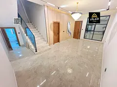 Two-story villa with a rooftop terrace and relaxation area, located next to the famous Al Hamidiya P