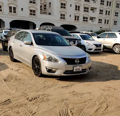 White Nissan Altima personal used in dubai