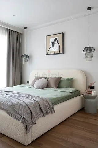 Modern upholstered double bed with curved headboard - cream boucle