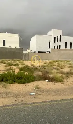 For sale: residential land in Al-Hoashi area, Al-Badiyah suburb, Sharjah Emirate.   With an area of 3,156 square feet.   In a very excellent location,