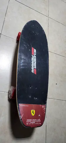 Used Short Skateboard/Cruiser Board – Ferrari-branded deck, red wheels